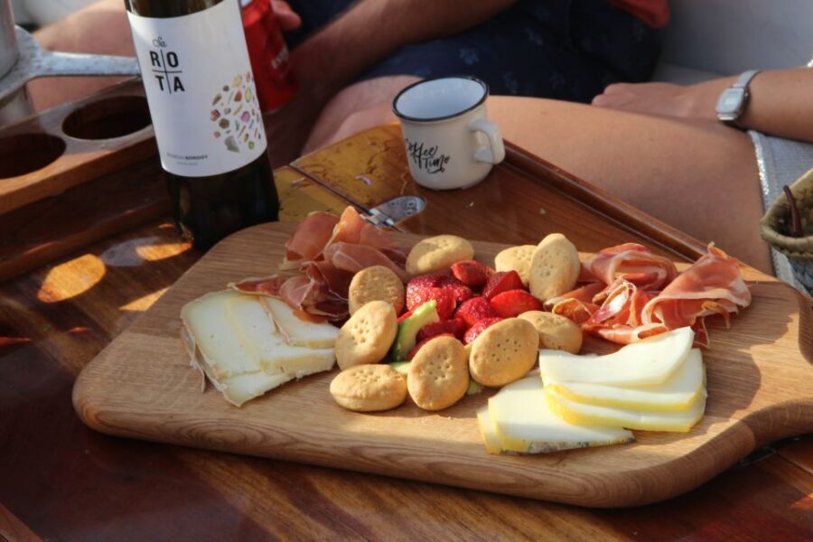 Alcudia: Traditional Wooden Boat Trip with Snorkeling - Paddleboarding around Aucanada or Coll Baix: fun without the full-day commitment