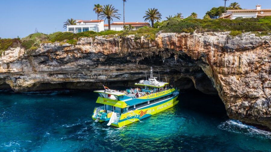 From Calas de Mallorca: Scenic Glass Bottom Boat Tour - What You’ll See on the Way: Pirate Cave, Cala Romantica, Sa Coma, and More