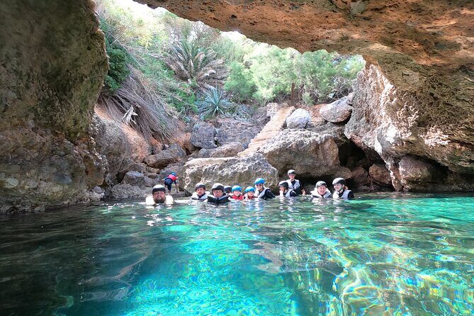 Mallorca: Kayaking, Sea Cave, Cliff Jumping & Snorkel Tour - Guides, humor, and keeping a big day safe