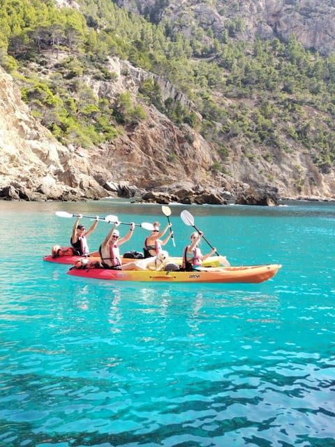 Sant Elm: Guided Kayak Sunset Tour with Picnic in a Cove - Picnic time at sunset: food break with sea-breeze calm